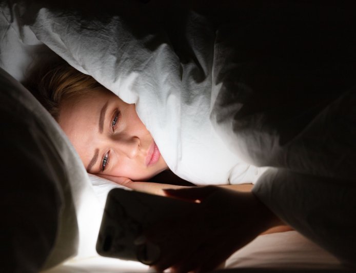 Why Checking Your Phone Before Bed Is Ruining Your Sleep
